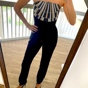 Black jumpsuit with brocade detail